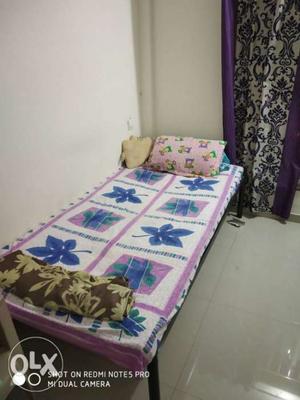 Bed with mattress and pillow is available for
