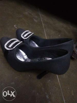 Black colour 4 inches heels...size 7