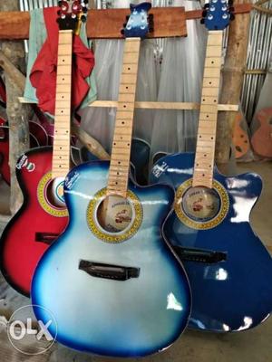 Blue And Red Wooden Guitars