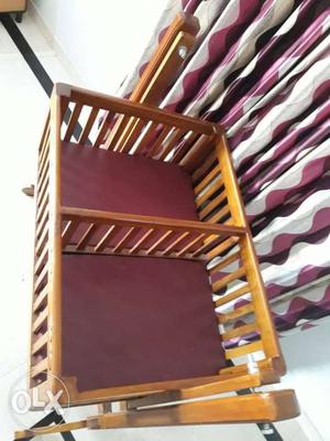Brown Wooden Framed Brown Padded Armchair