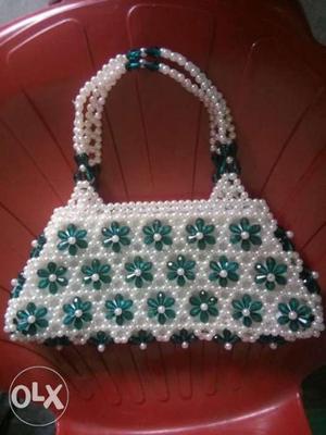 Extremely beautiful fully handmade ladies bag.