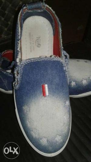 Pair Of Blue Denim Slip-on Shoes