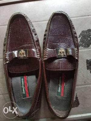 Pair Of Brown Leather Loafers