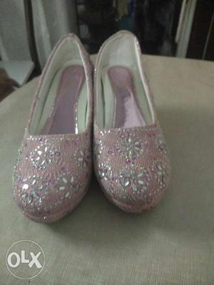 Pair Of Pink Glittered Slip-on Shoes