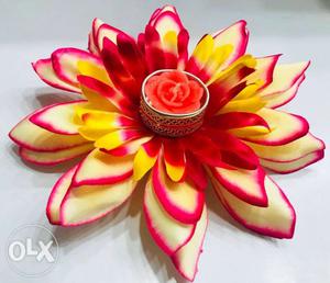 Red And White Petaled Flower floating diya
