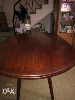 Round Brown Wooden Dining Table
