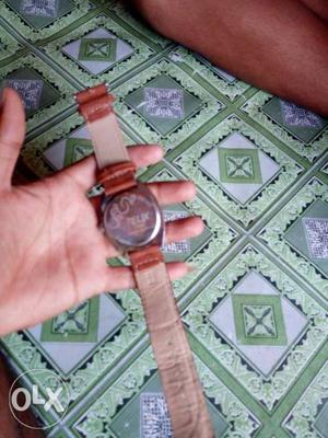 Round Silver-colored Watch With Brown Strap