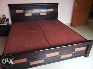 Teak wood bed almost like new with large storage, nearly an