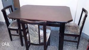 Teak wood table with three teak chairs