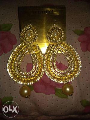 Two Gold-colored Teardrop Earrings