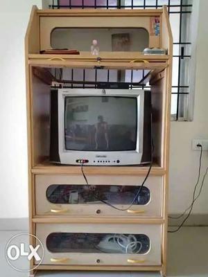White CRT TV; Brown Wooden TV Hutch