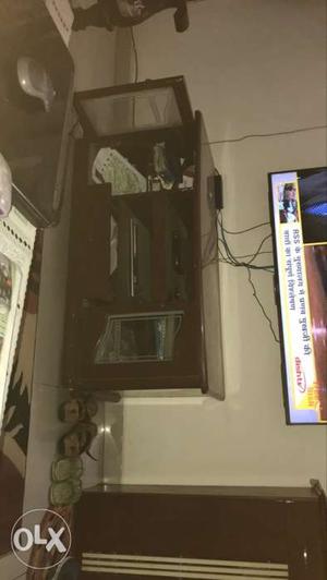 Wooden Cabinet below tv in very good condition