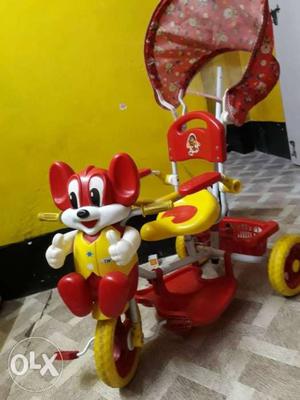Yellow And Red Pedal Trike