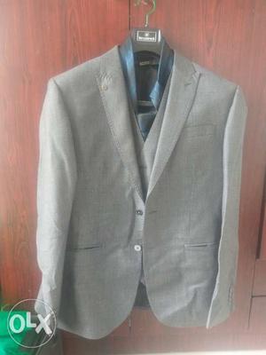 3 piece blackberry suit without trouser. Used