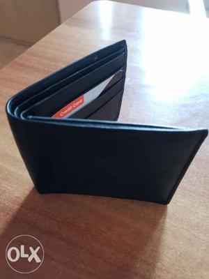 Black wallet, new, never used.