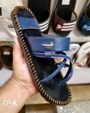 Blue, Black, And Yellow Suede Nike Sandal