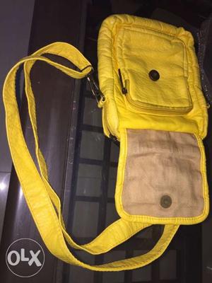 Brand new, unused sling with 3/4 zippers