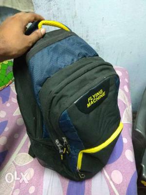 Gray, Yellow, And Blue Flying Machine Backpack