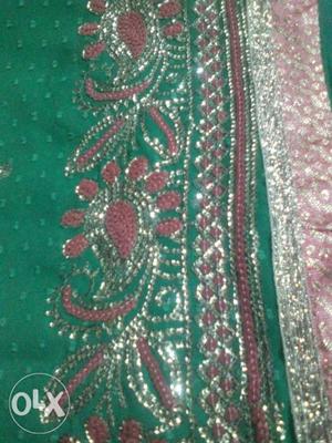 Green, Pink, And White Floral Textile