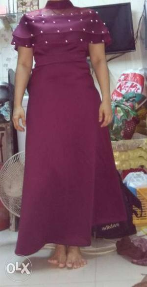 Maroon gown.. Medium size. hurry up.. there for