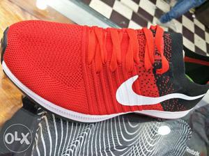 Red And Black Nike Athletic Shoe