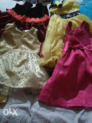 1 time used new frocks for baby 4 frocks