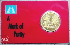 A Mark of purity - 24k  fine, 10gm gold coin