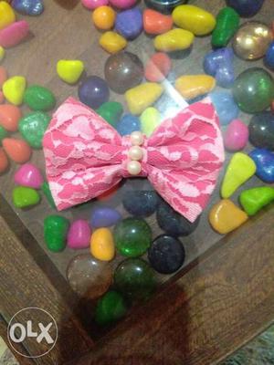 A beautiful elegant pink bow hair clip