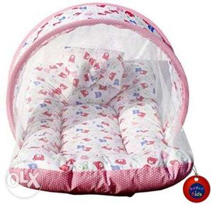 Baby's Pink And White Floral Bouncer