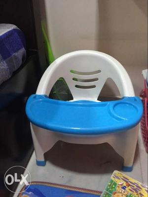 Baby's White And Blue Plastic Feeding Chair