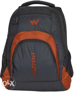 Black And Orange Wildcraft Backpack