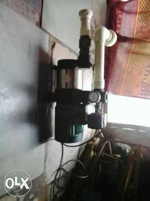 Black, White, And Green Electric Water Pump Motor