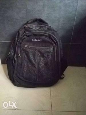 Black safari backpack with 5 years warranty