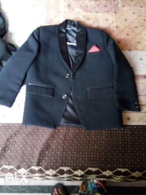 Black shining coat with cover for 6-7years of age