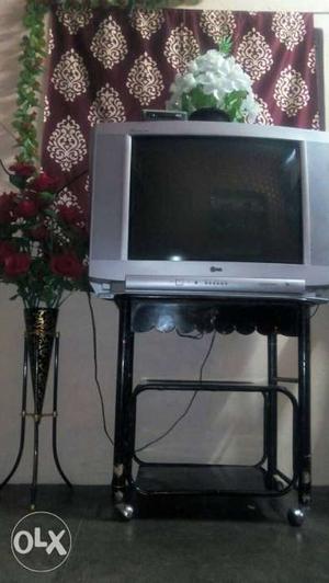 Lg tv with back woofer nd price is negotiable nd serious