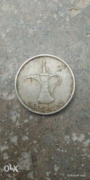 Old arab coin. and. indian 10 paisa.