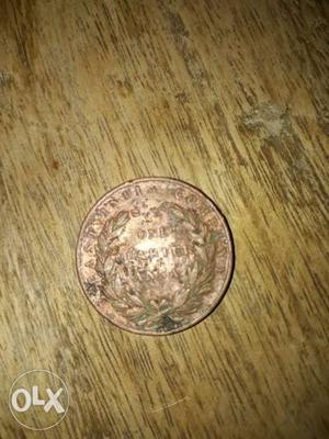 One quarter anna indian coin in 