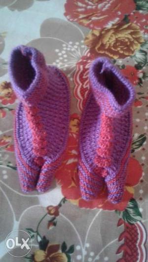 Pair Of Purple Knitted Shoes