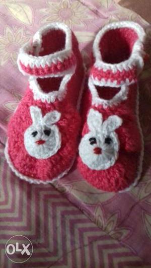 Pair Of Red-and-white Knitted Boots