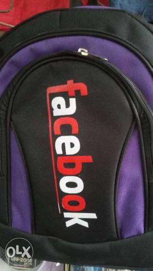 Purple And Black Facebook Printed Backpack