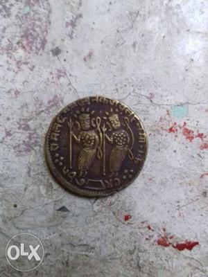 Round Brown Indian Paise Coin