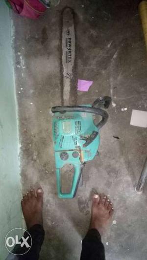 Teal And Black Power Tool