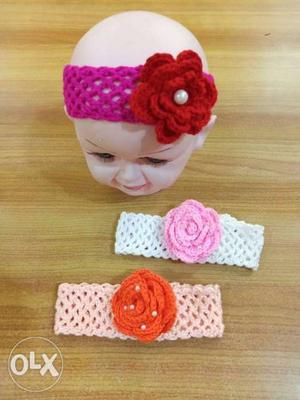 Three Pink, Orange, And White Knit Floral Accent Headbands
