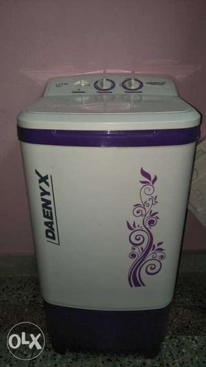 White And Purple Plastic Container