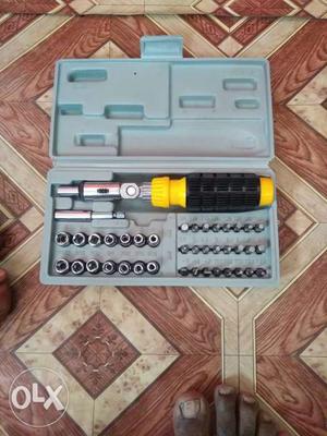 Yellow And Black Handheld Tool With Case