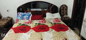 Double bed in heavy wood material urgent sale plz