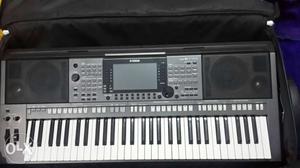 Grey, White, And Black Electronic Keyboard With Bag