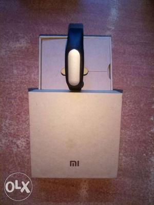 Mi fitness tracking band with original box and