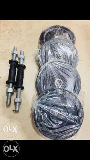 Pair Of Black-and-gray Dumbbell Rods And 8 Weight Plates