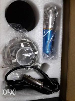 Silver And Blue Microphone for song video and audio